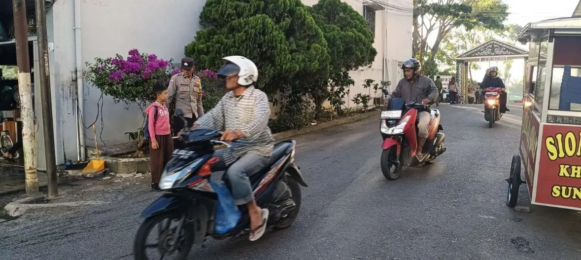 Polsek Lut Tawar Laksanakan Strong Point Pagi, Wujudkan Keamanan dan Kelancaran Lalu Lintas