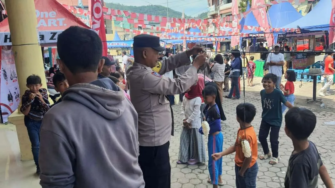 Polsek Lut Tawar Hadir Beri Semangat, Warga Antusias Meriahkan HUT ke-80 RI dengan Aneka Perlombaan