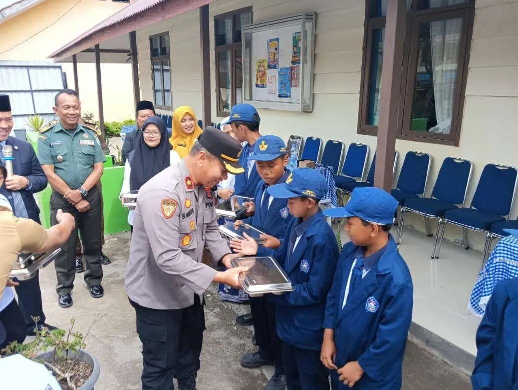 Wakapolres Aceh Tengah Hadiri Launching Penerimaan Manfaat Makanan Bergizi Gratis di SLTP Negeri 1 Takengon